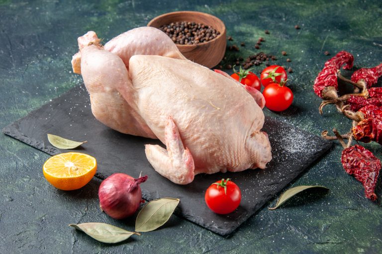 front-view-fresh-raw-chicken-with-tomatoes-dark-meal-animal-photo-food-color-chicken-kitchen-meat